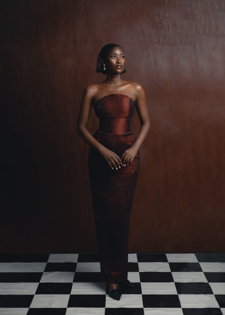 A stunning portrait of a woman in traditional Nigerian fashion, showcasing elegance and cultural style.